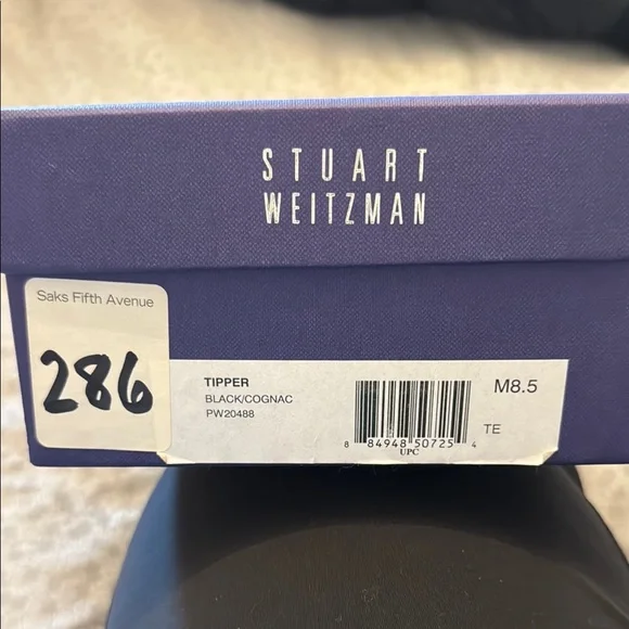 Stuart Weitzman Black and Brown Flats for Effortless Style - Picture 4 of 6